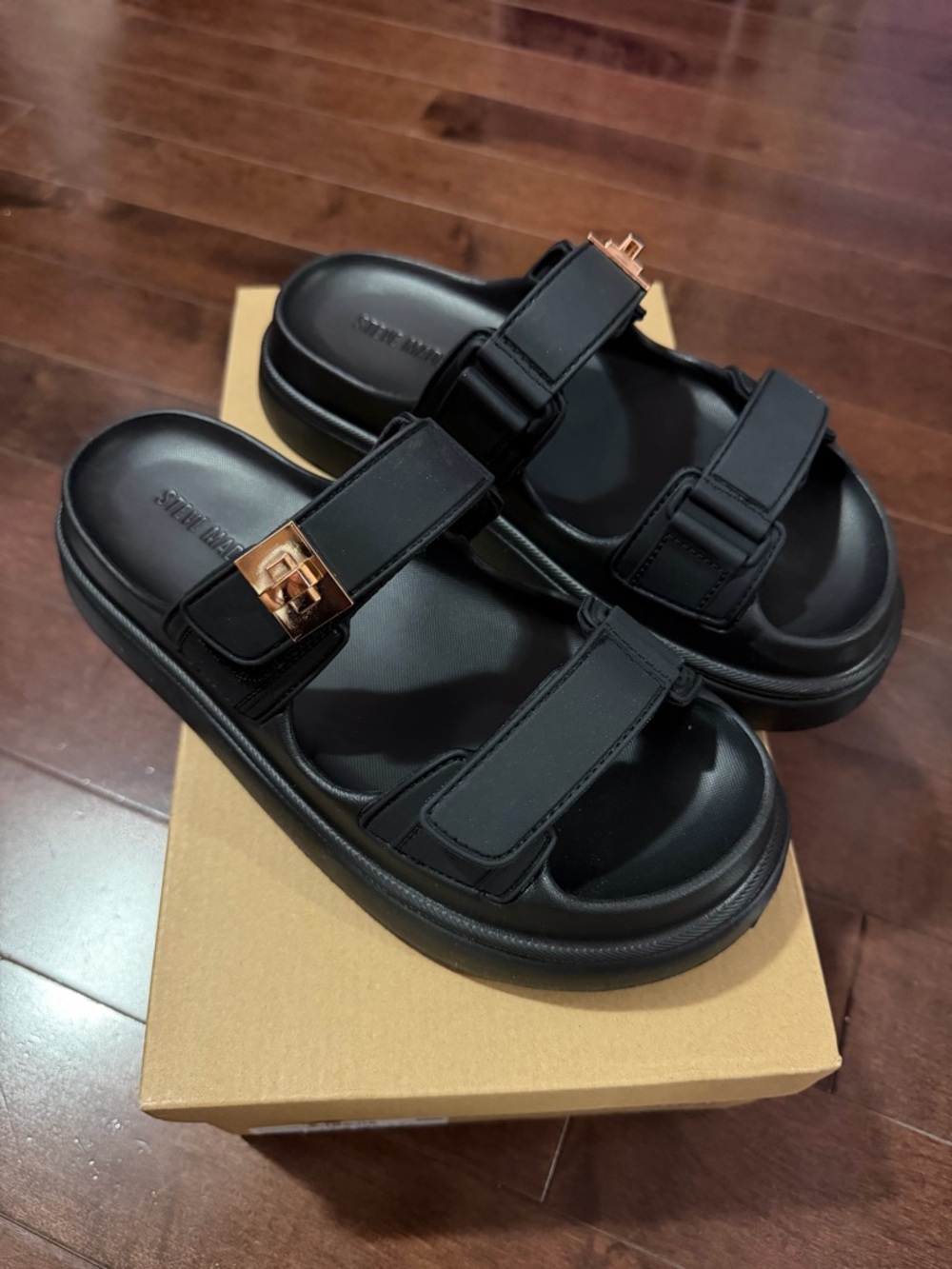 Steve Madden Black Slide Sandals with Gold Buckle